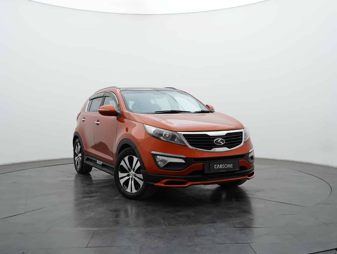 Kia_Sportage_2013_Orange_B2C_CARSOME