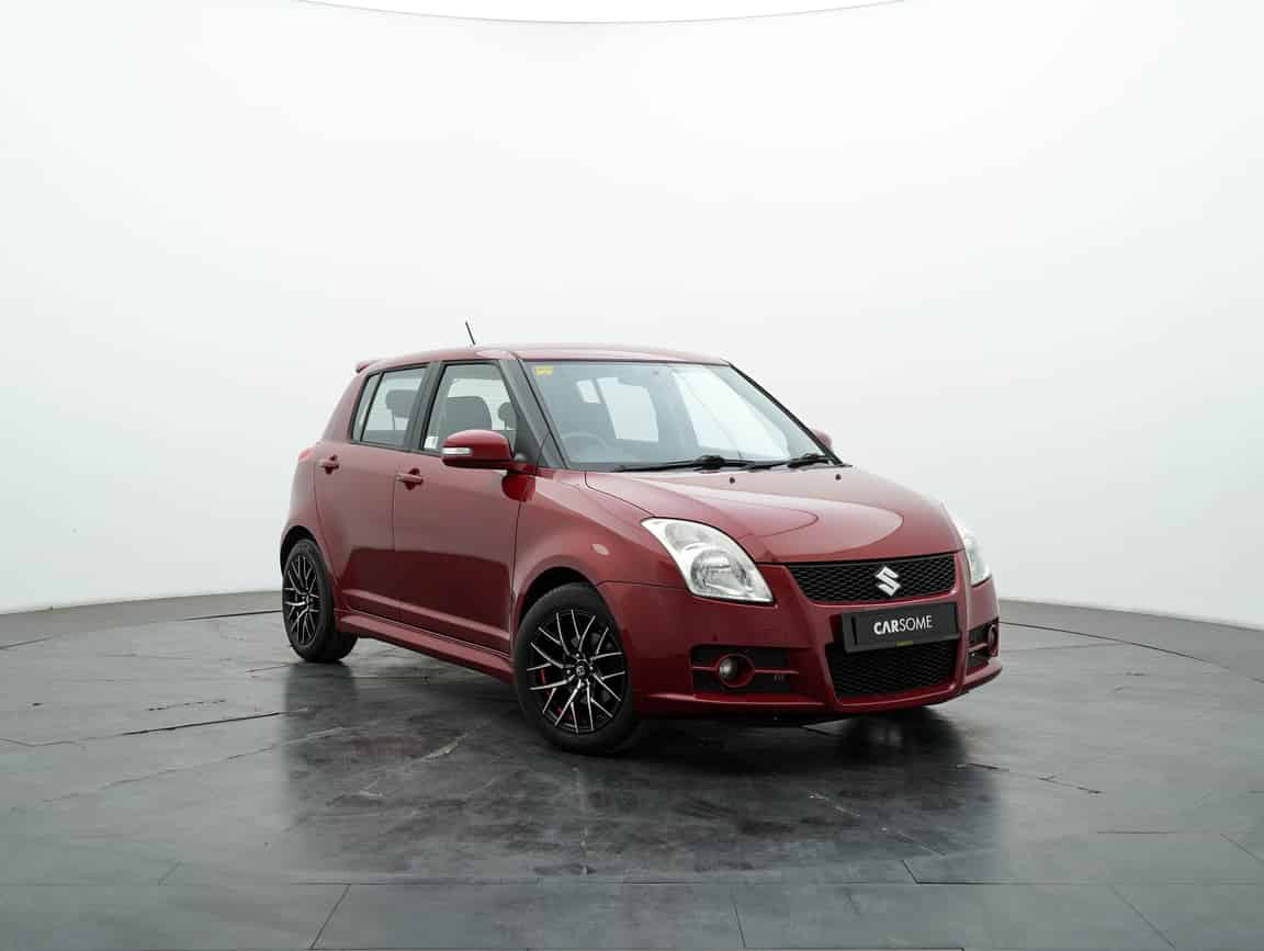 Suzuki_Swift_2011_Merah_B2C_CARSOME