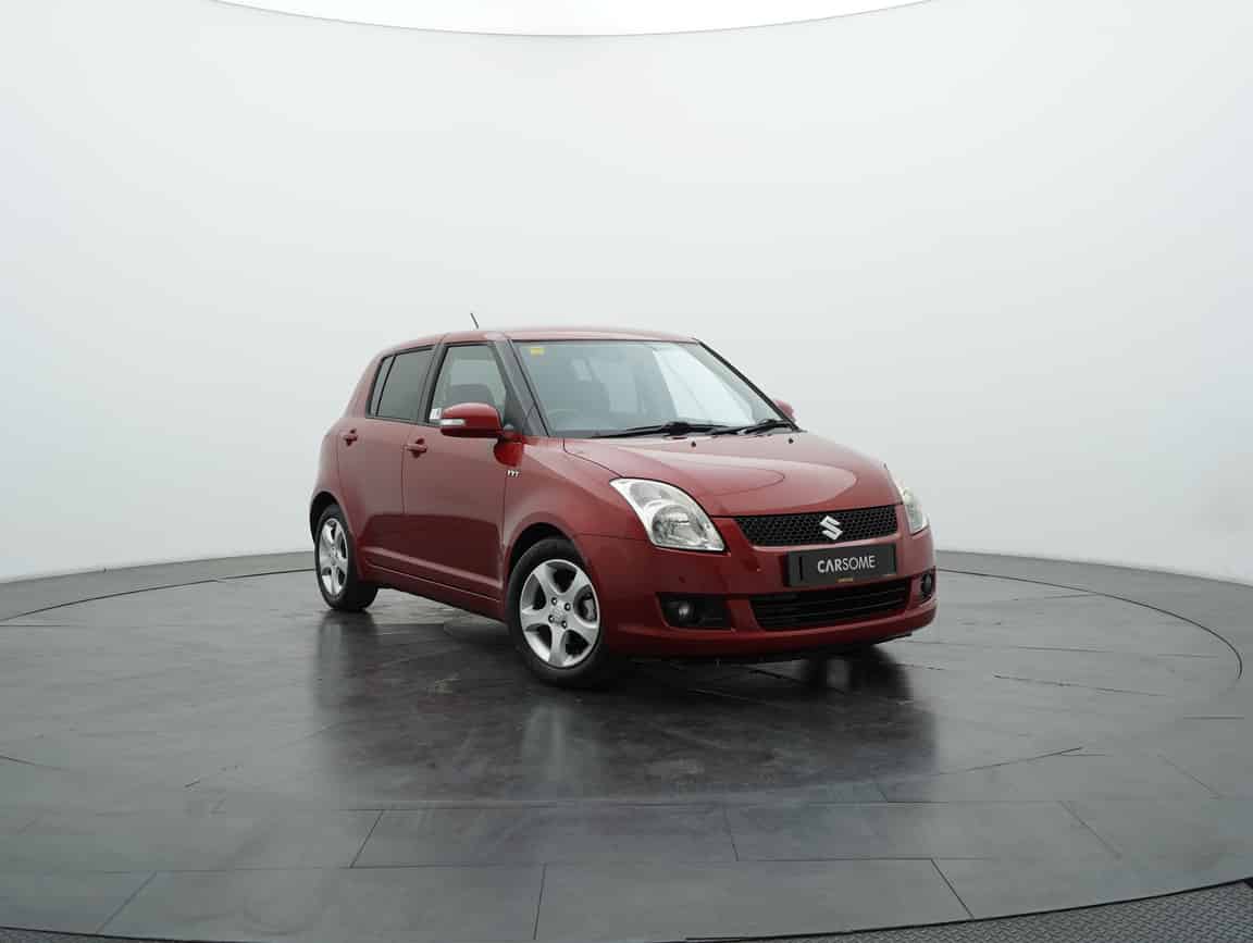 Suzuki_Swift_2011_Red_B2C_CARSOME