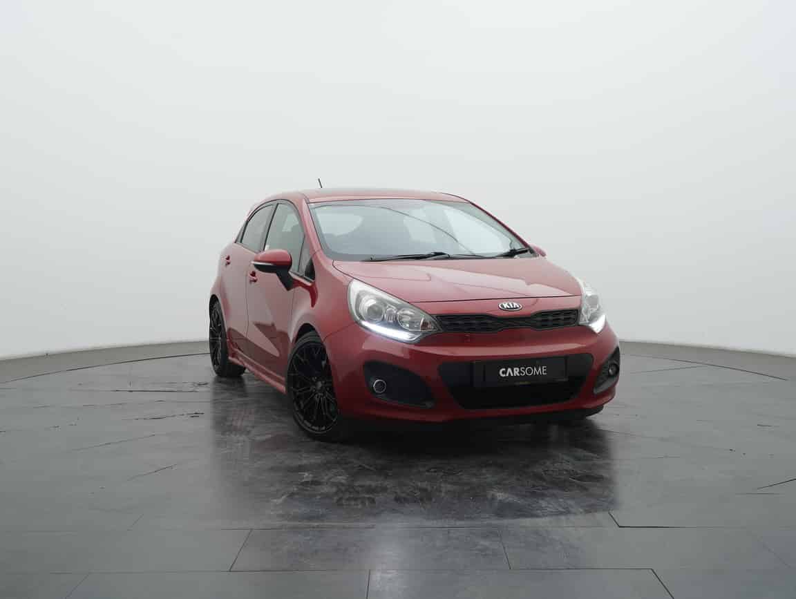Kia_Rio_2014_Merah_B2C_CARSOME
