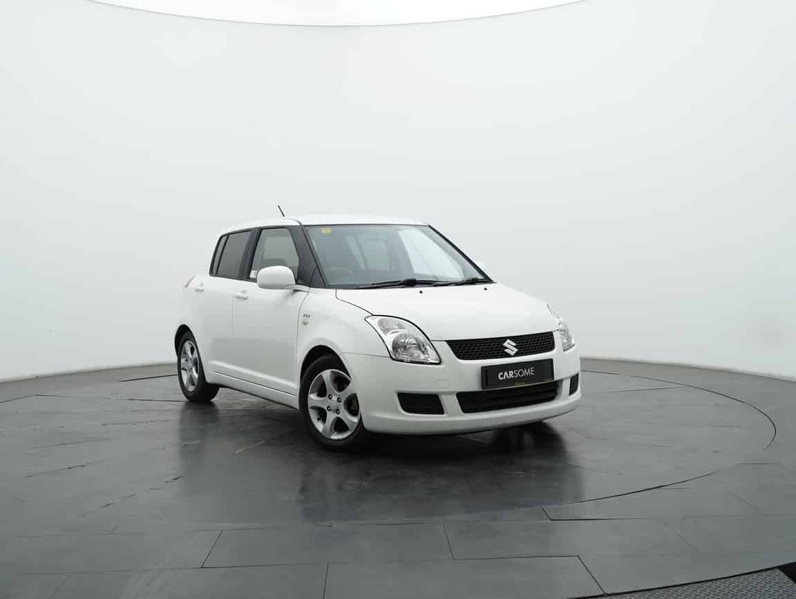 Suzuki_Swift_2011_White_B2C_CARSOME