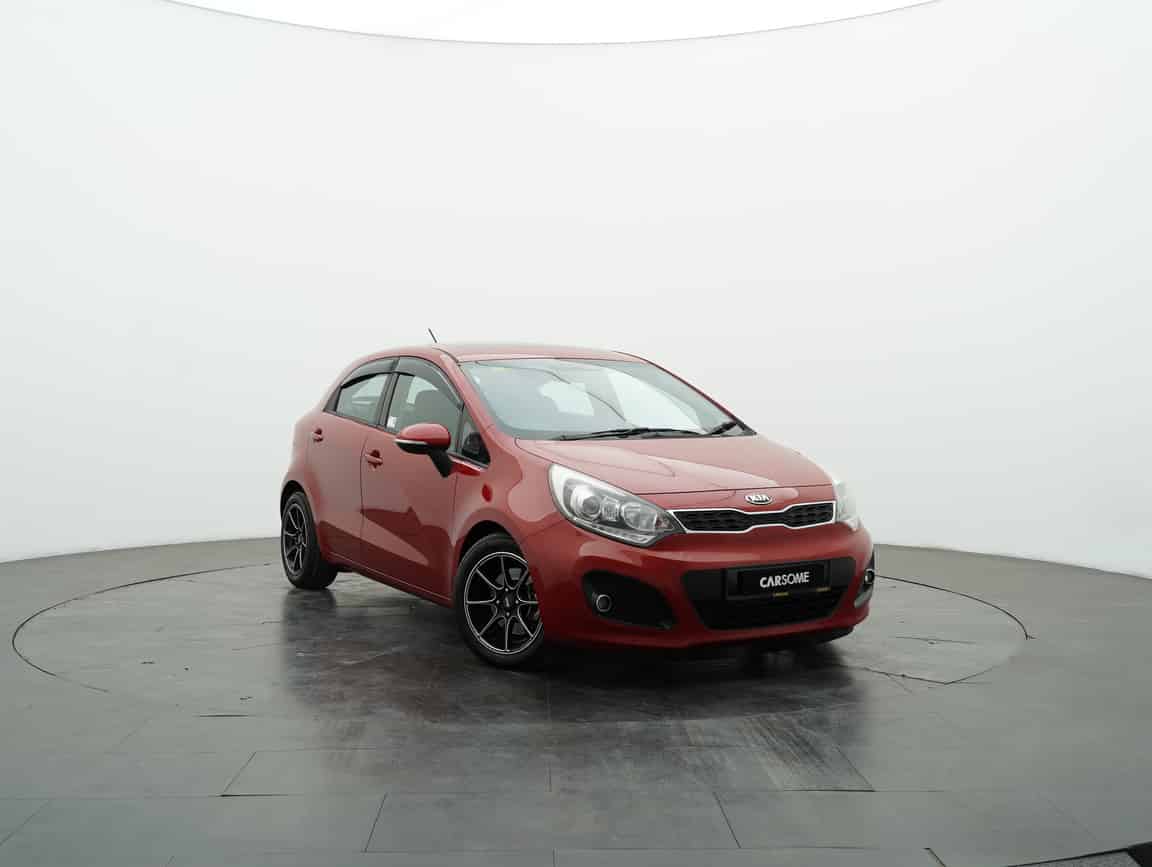 Kia_Rio_2014_Red_B2C_CARSOME