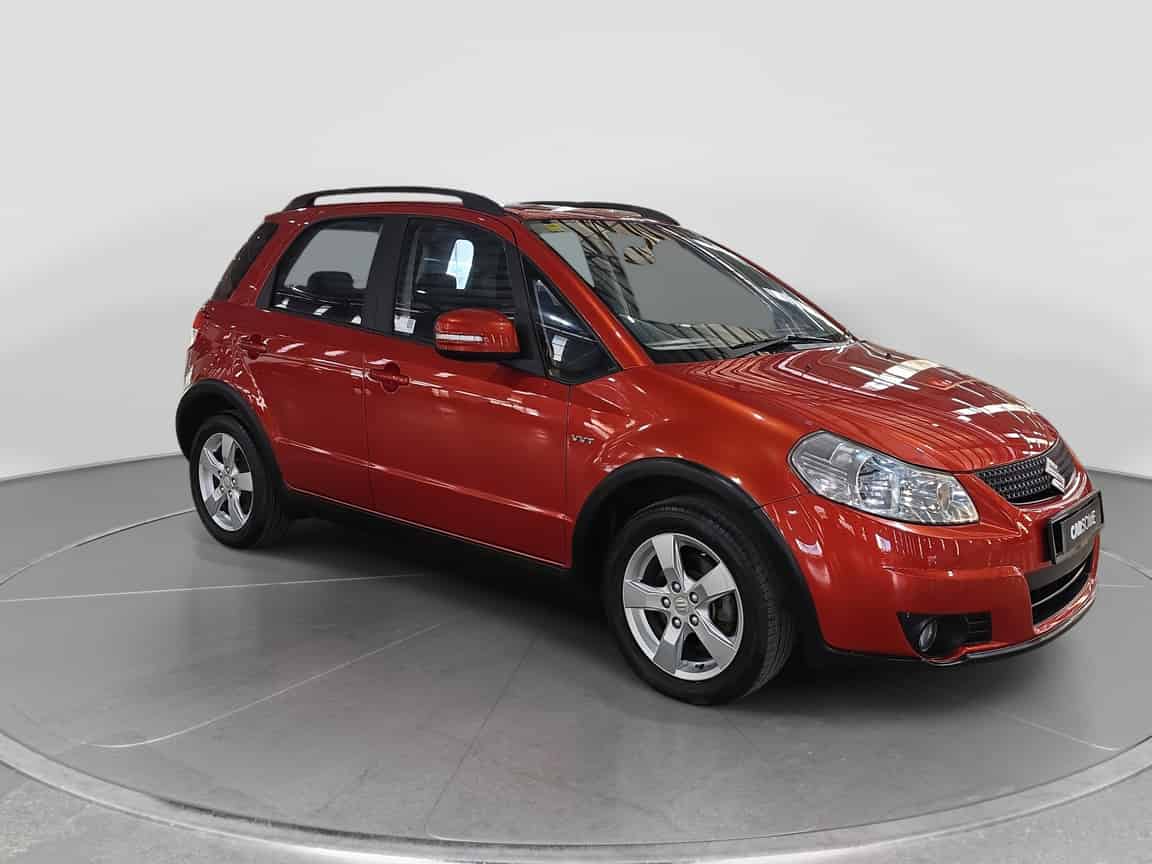 Suzuki_SX4_2012_Orange_B2C_CARSOME