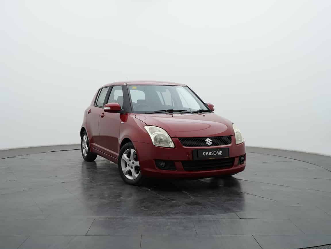 Suzuki_Swift_2011_Merah_B2C_CARSOME