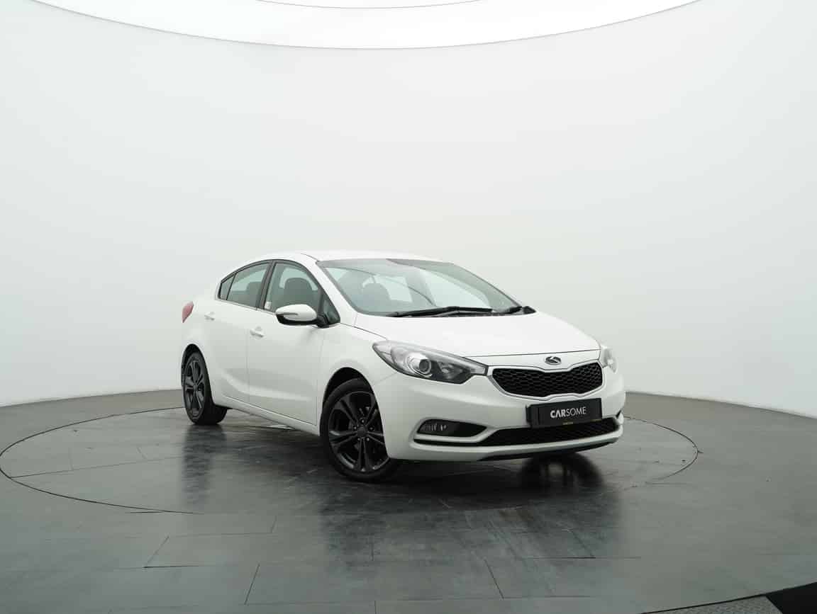 Kia_Cerato_2014_White_B2C_CARSOME