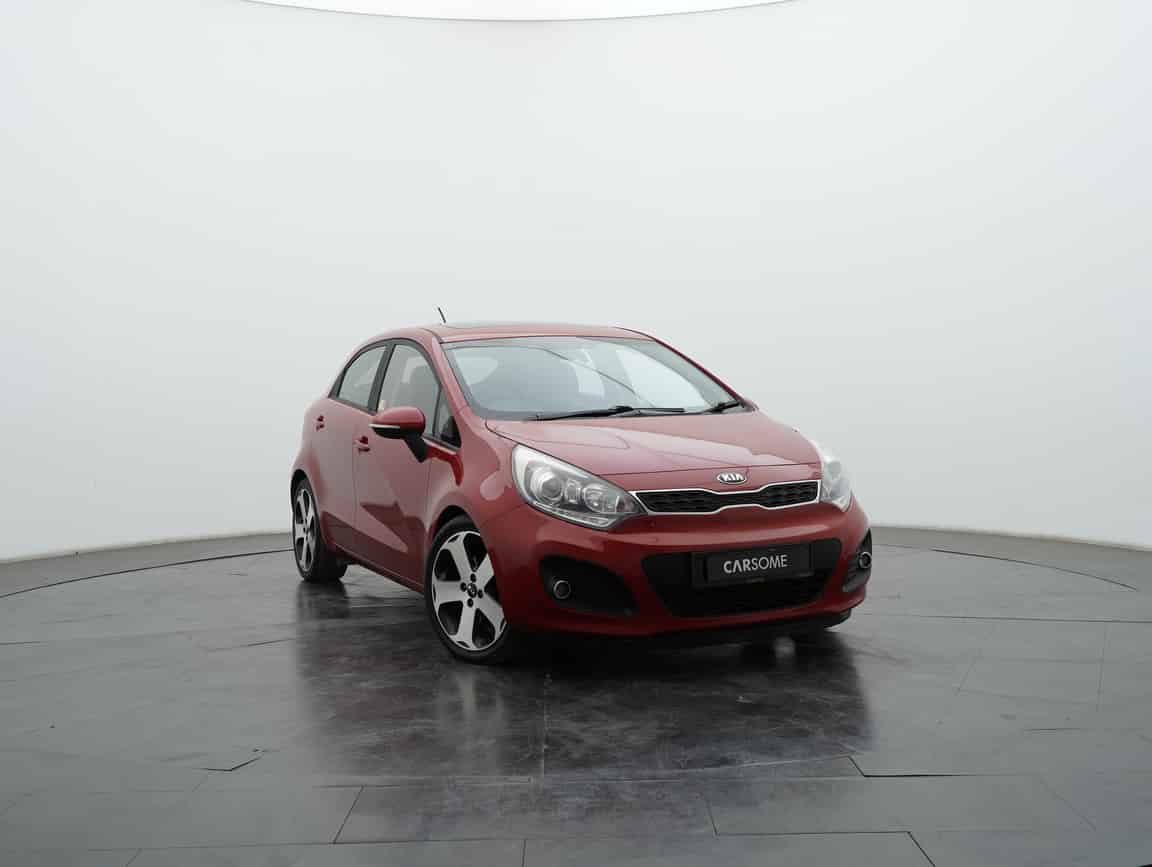 Kia_Rio_2014_Merah_B2C_CARSOME