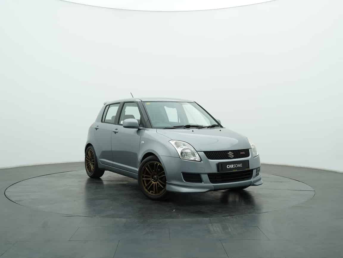 Suzuki_Swift_2012_Silver_B2C_CARSOME