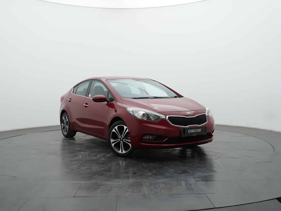 Kia_Cerato_2014_Merah_B2C_CARSOME