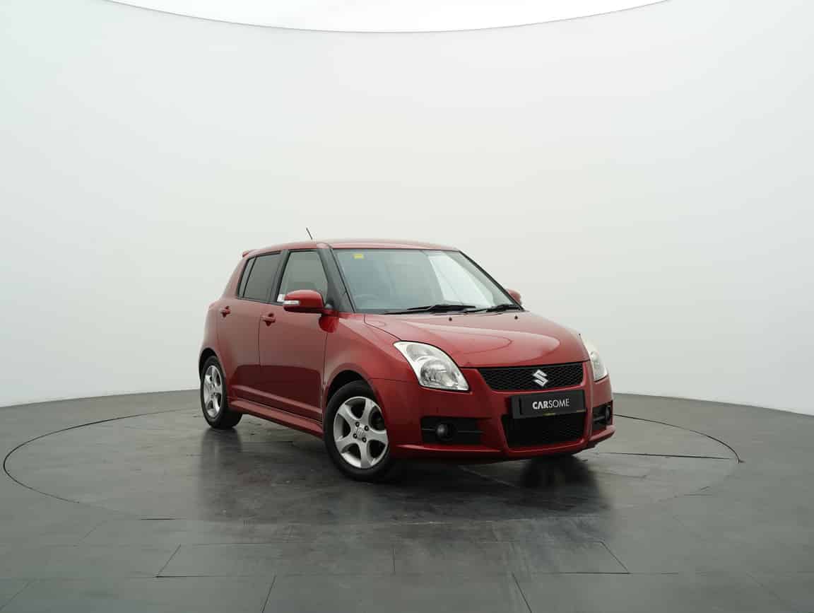 Suzuki_Swift_2011_Merah_B2C_CARSOME