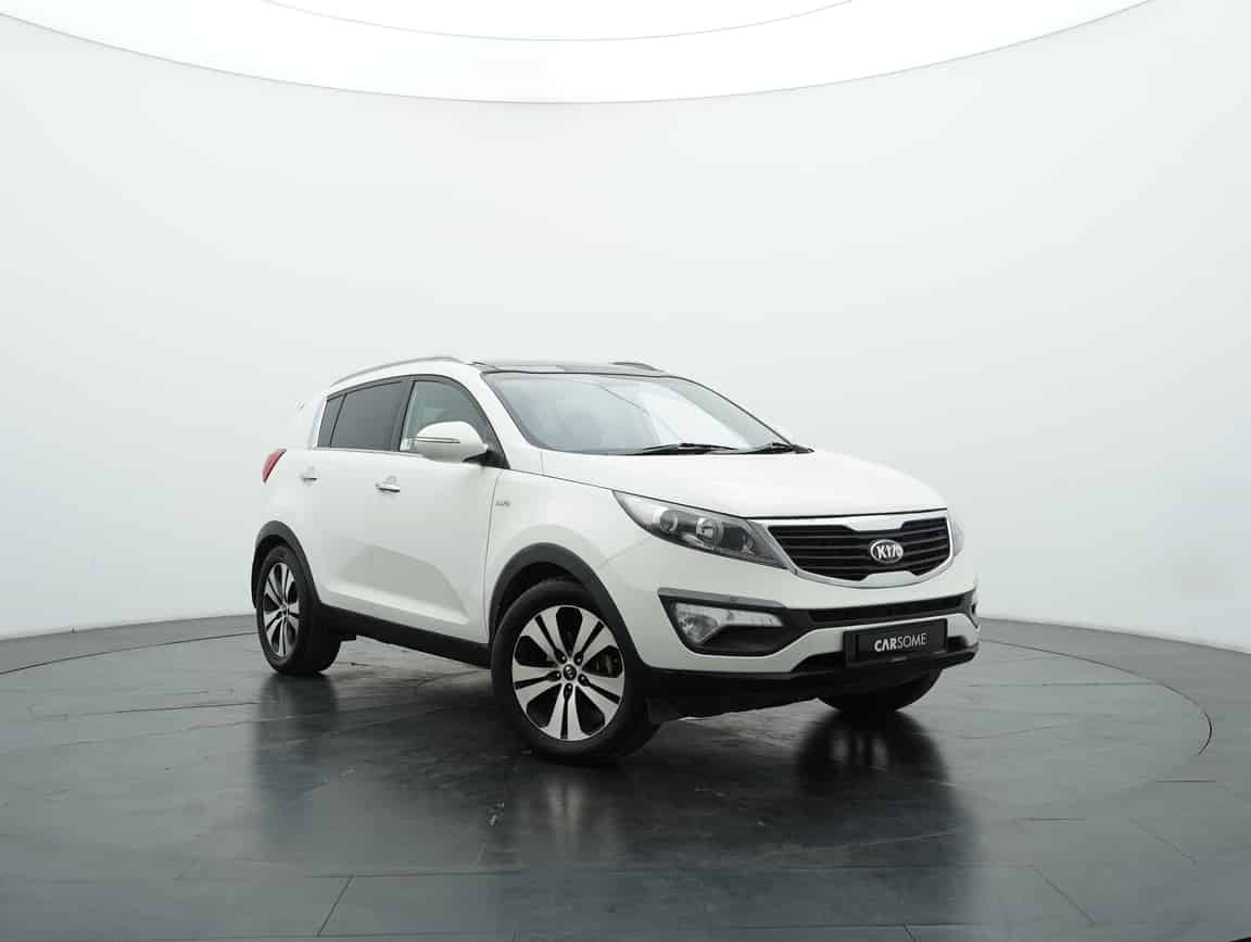 Kia_Sportage_2013_White_B2C_CARSOME
