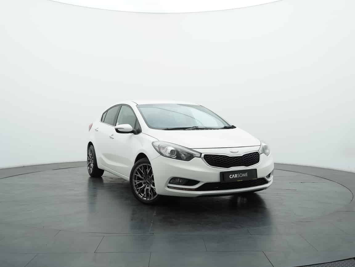 Kia_Cerato_2013_White_B2C_CARSOME
